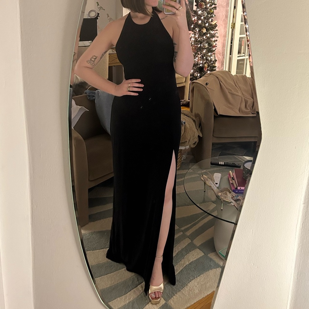 Black floor length gown with slit